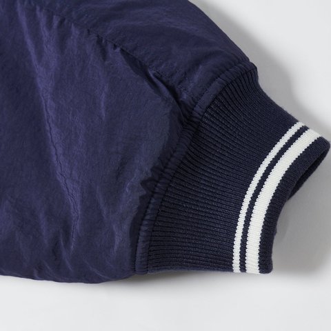 REVERSIBLE QUILTED SPORTS BOMBER NAVY